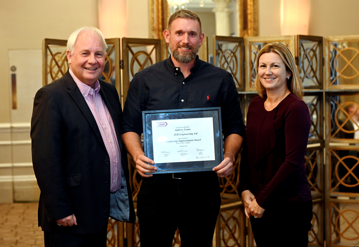 Andrew Evans with his award certificate for Leadership Improvement